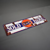 Sold Here Motor Oil Sign
